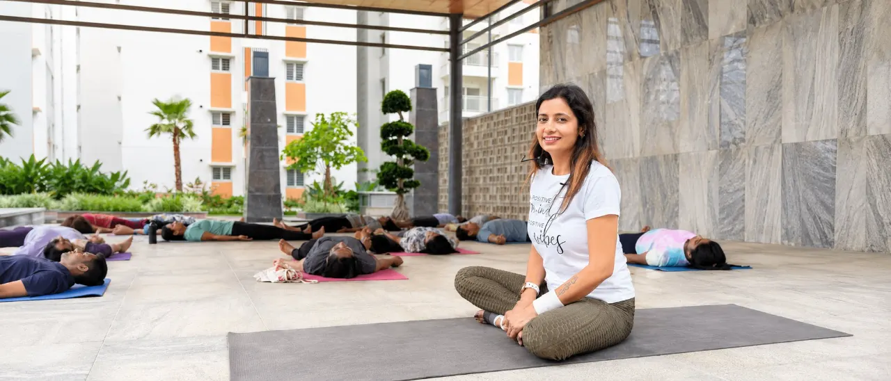 Poonam leading a calm outdoor wellness session